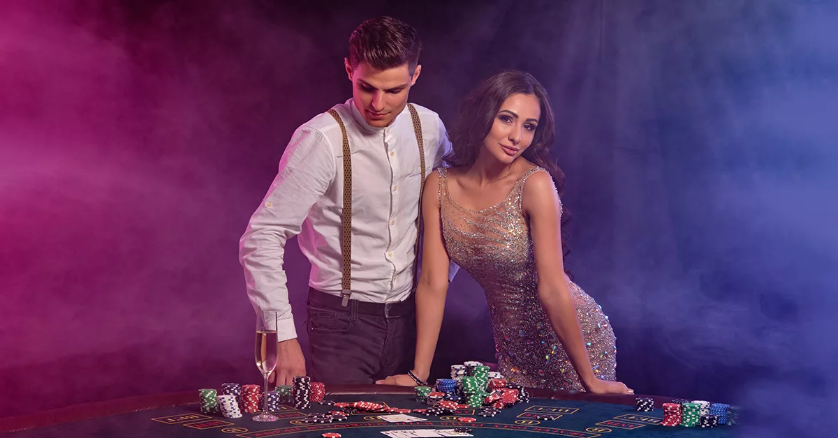Man and a women in casino attire