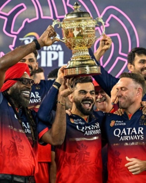 IPL 2025 Champions RCB Lifting the Trophy